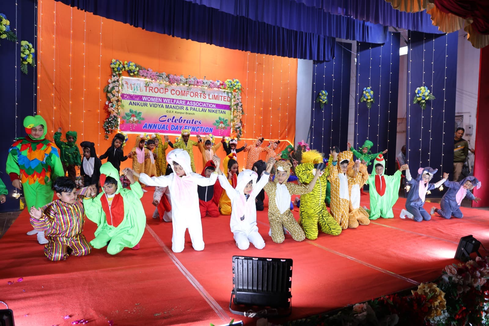 Annual Day Function stage with kids in animal costumes performing